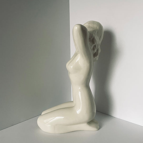 'the lady' sculpture